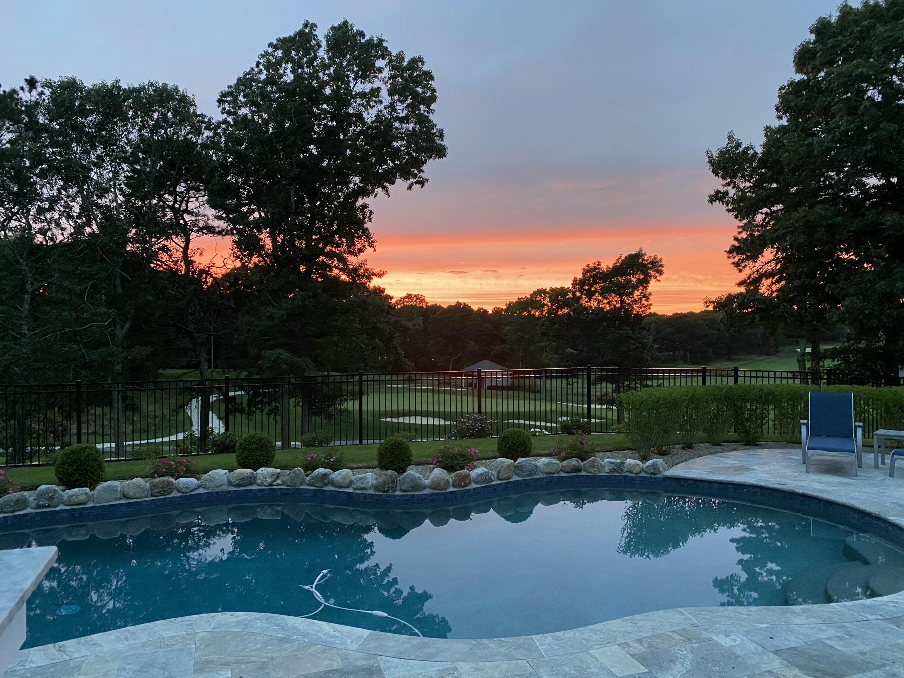101 Greensward Road Mashpee, MA 02649 - Photo 2 of 75 101greensward pool pic sunset2