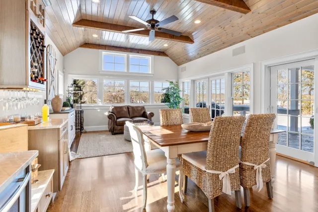 a spacious bathroom with a granite countertop tub sink and shower