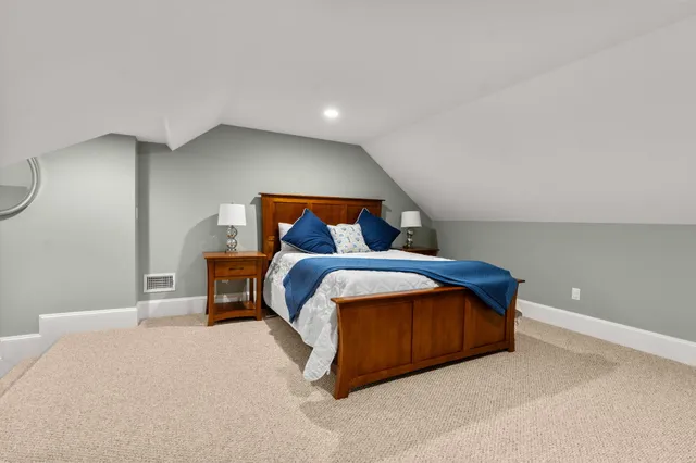 a view of a street with a building in the background