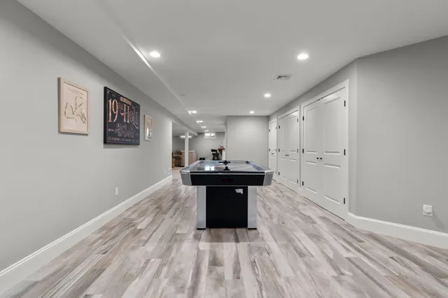 a picture of a bench in front of a window