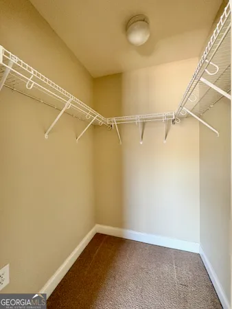 a view of small space with racks on the wall