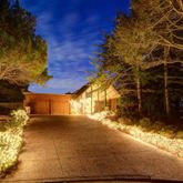 a view of a pathway with a yard