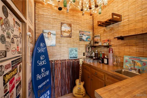 a view of a chairs and table in the balcony