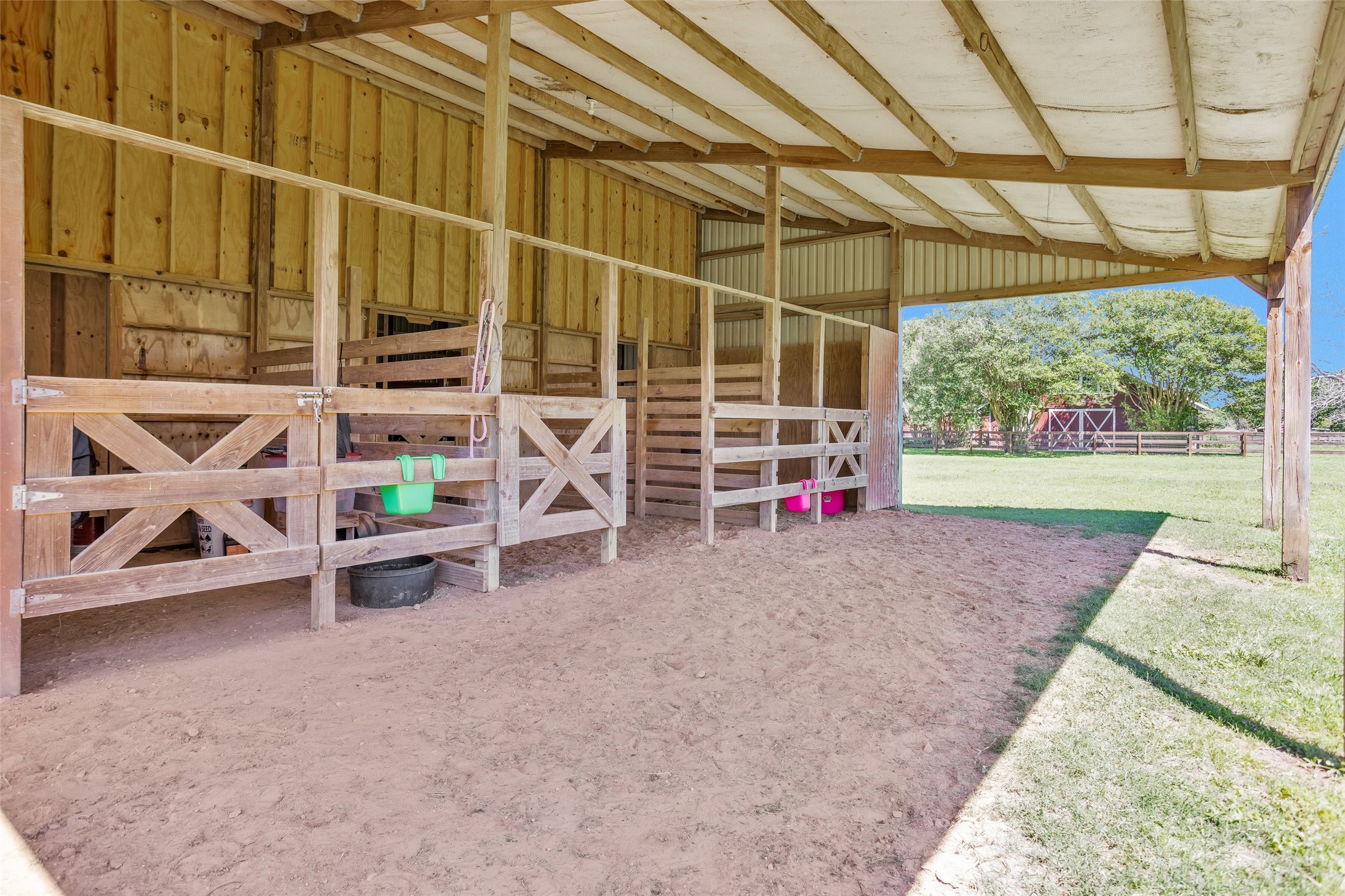 Tbd Walker Lane Fulshear, TX 77406 - Photo 11 of 17 a view of a room with wooden floor and iron fence