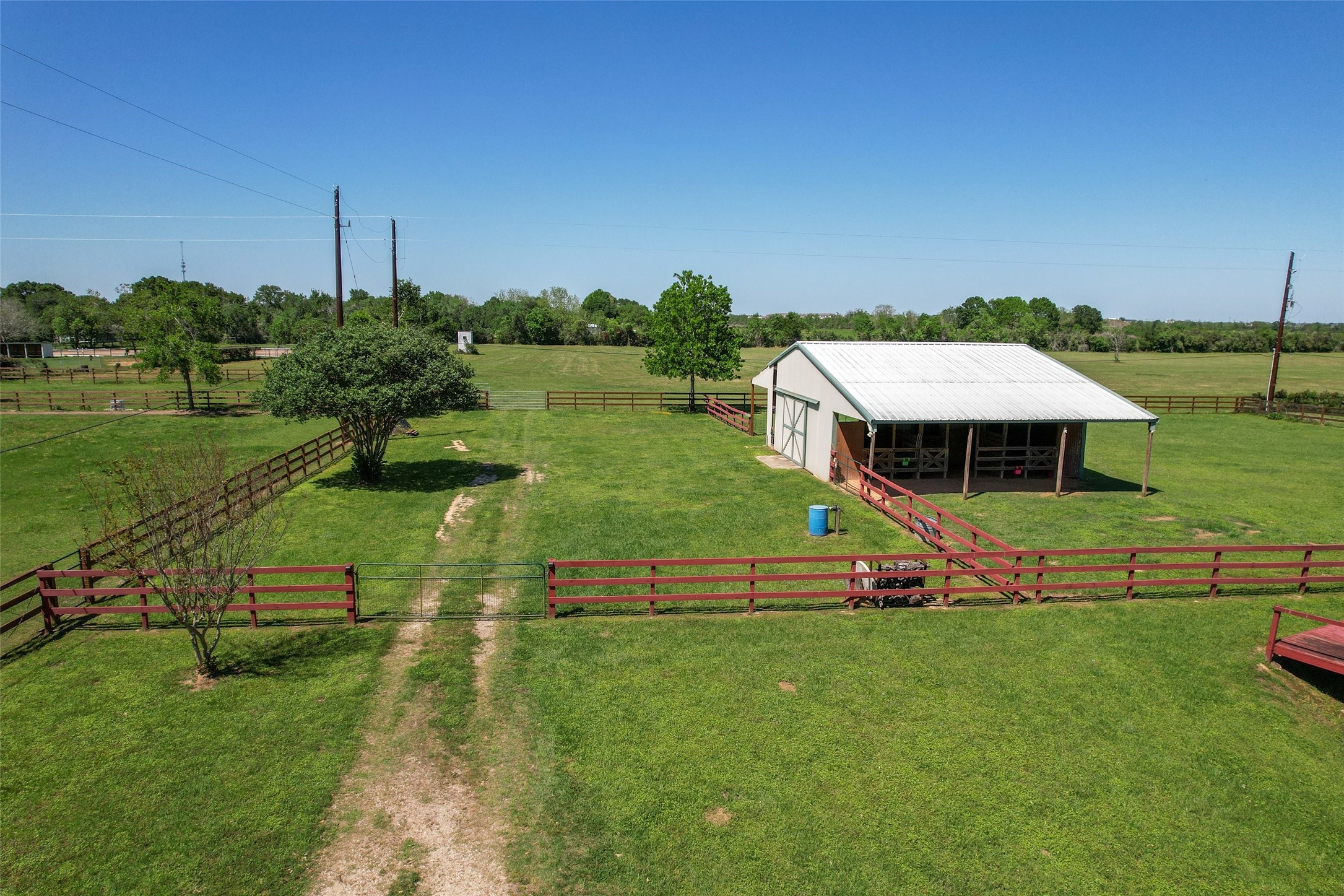 Tbd Walker Lane Fulshear, TX 77406 - Photo 16 of 17 an aerial view of a house with swimming pool garden view and a lake view