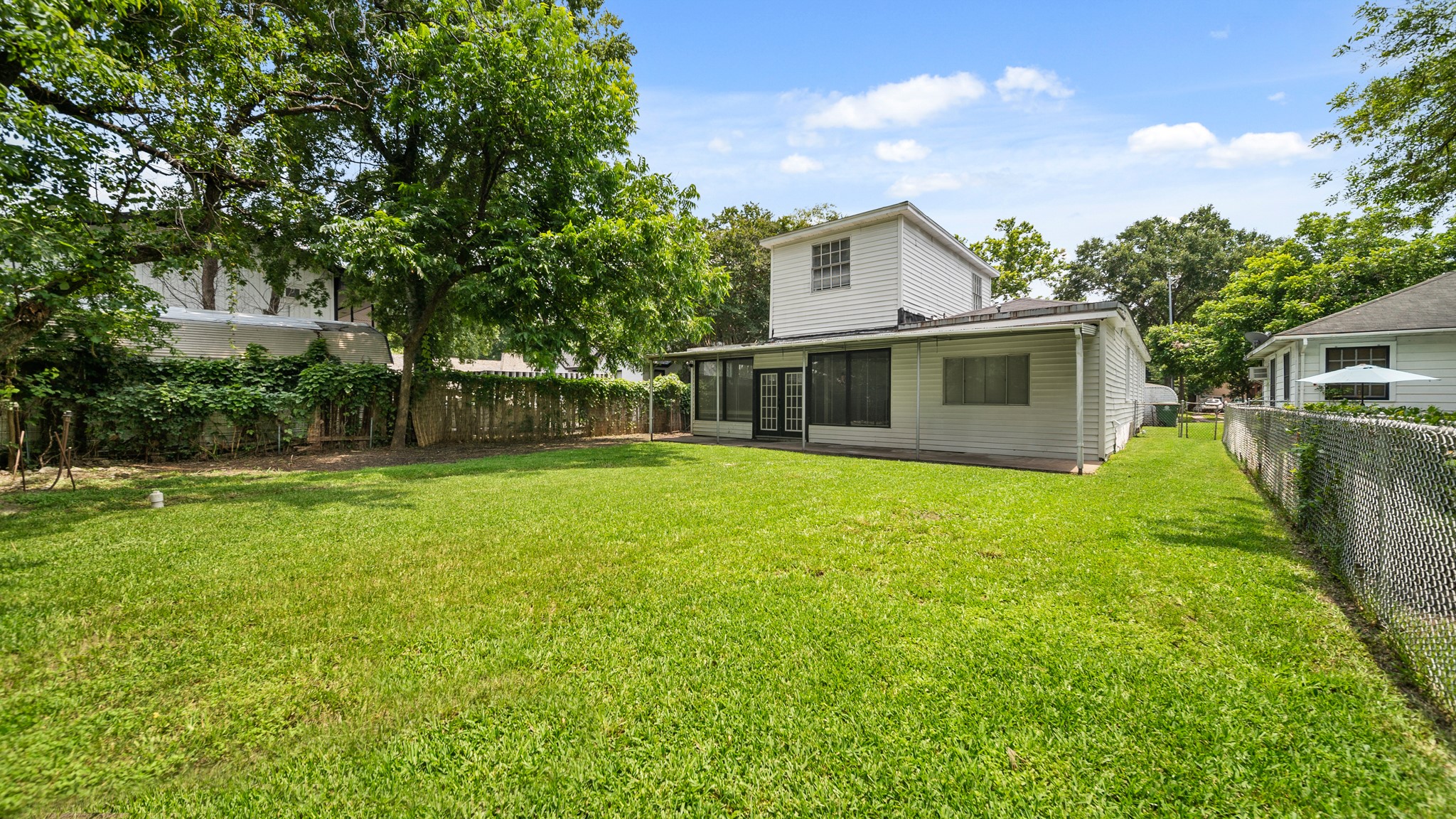 8327 Bonner Drive Houston, TX 77017 - Photo 4 of 37 a view of a house with backyard and a tree
