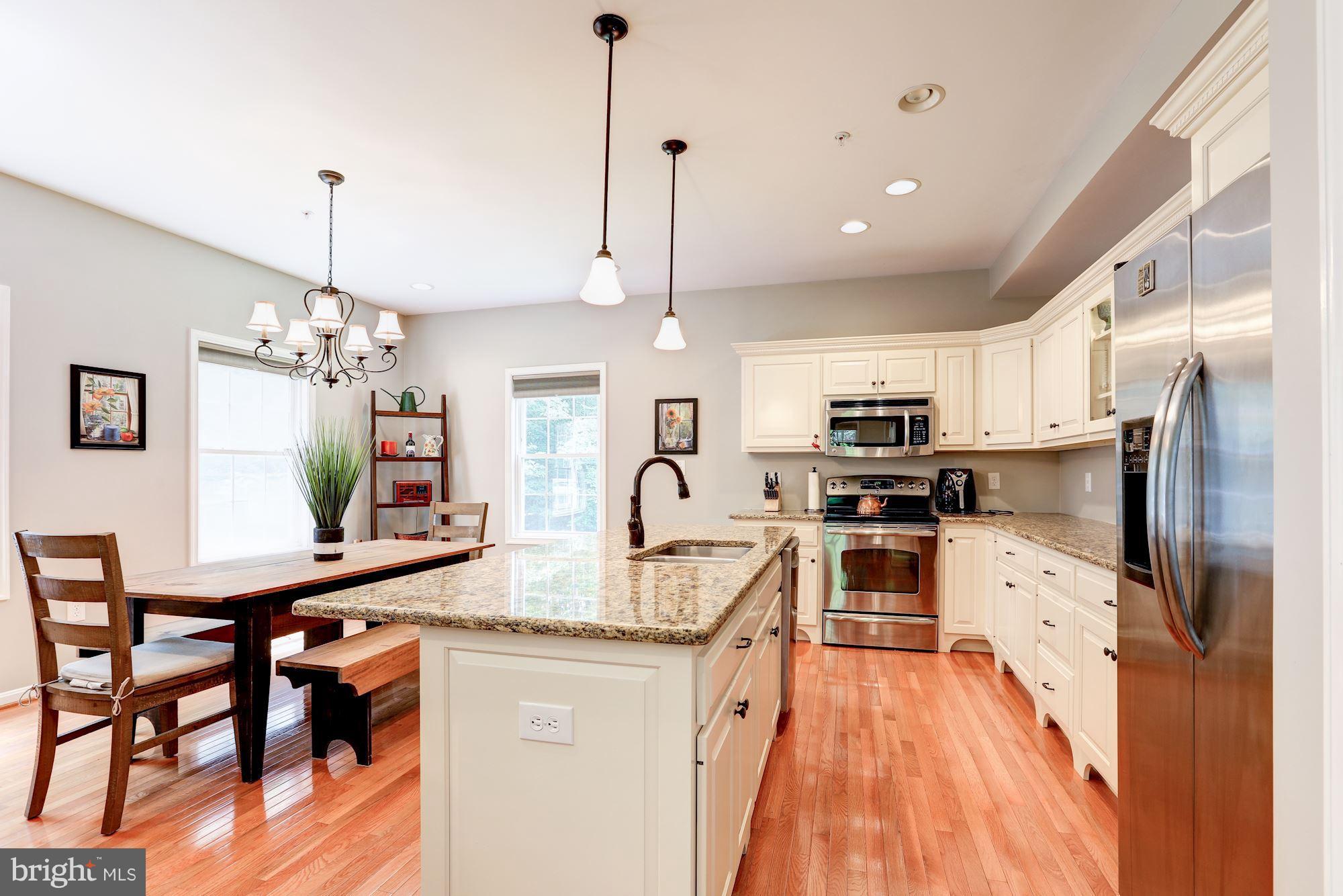 411 Heitzman Road Davidsonville, MD 21035 - Photo 2 of 29 Large open kitchen with granite counters