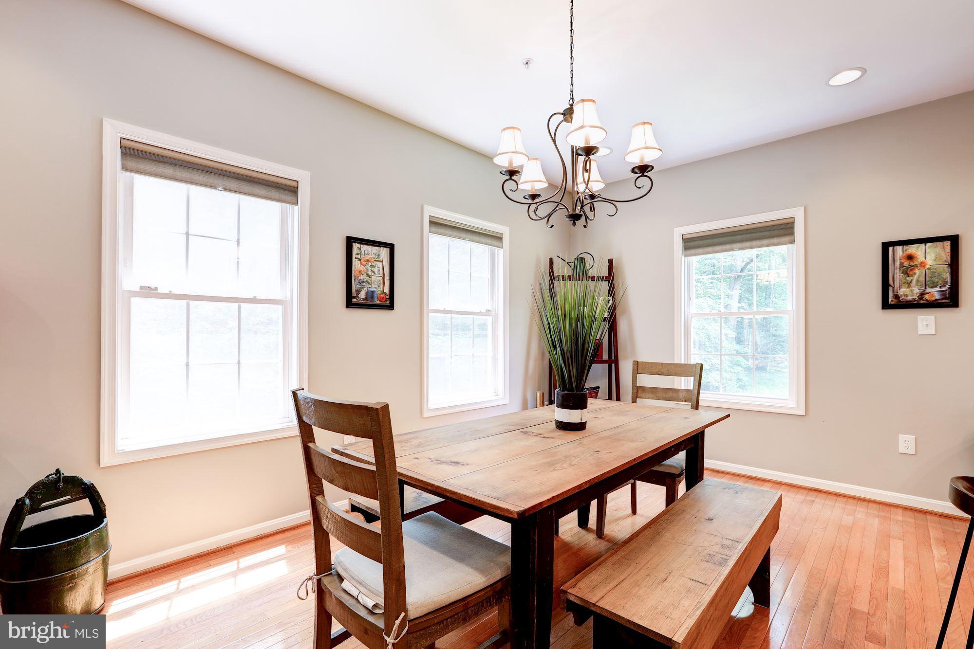411 Heitzman Road Davidsonville, MD 21035 - Photo 7 of 29 Dining room with recessed lighting and chandelier