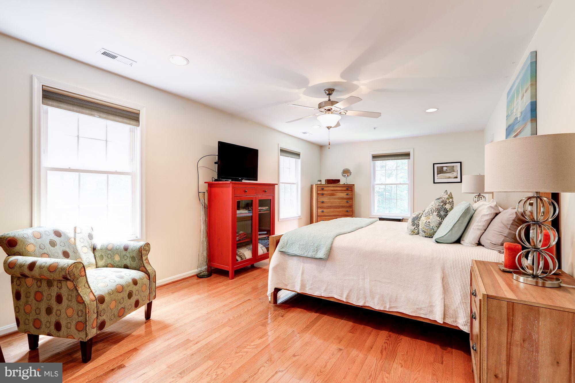 411 Heitzman Road Davidsonville, MD 21035 - Photo 10 of 29 Hardwood flooring and room for seating