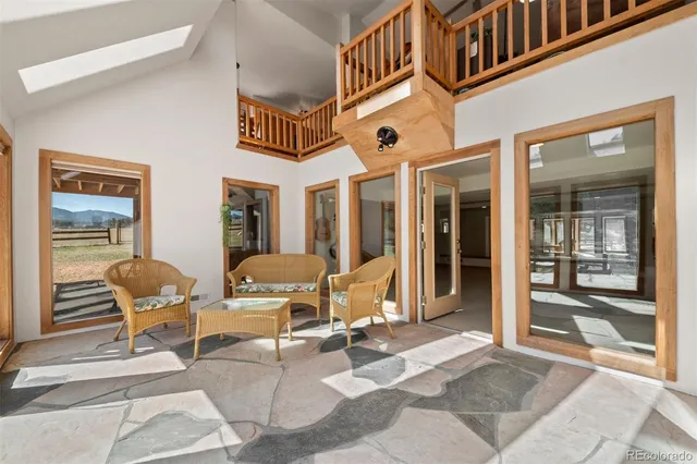 a view of a building with outdoor seating space