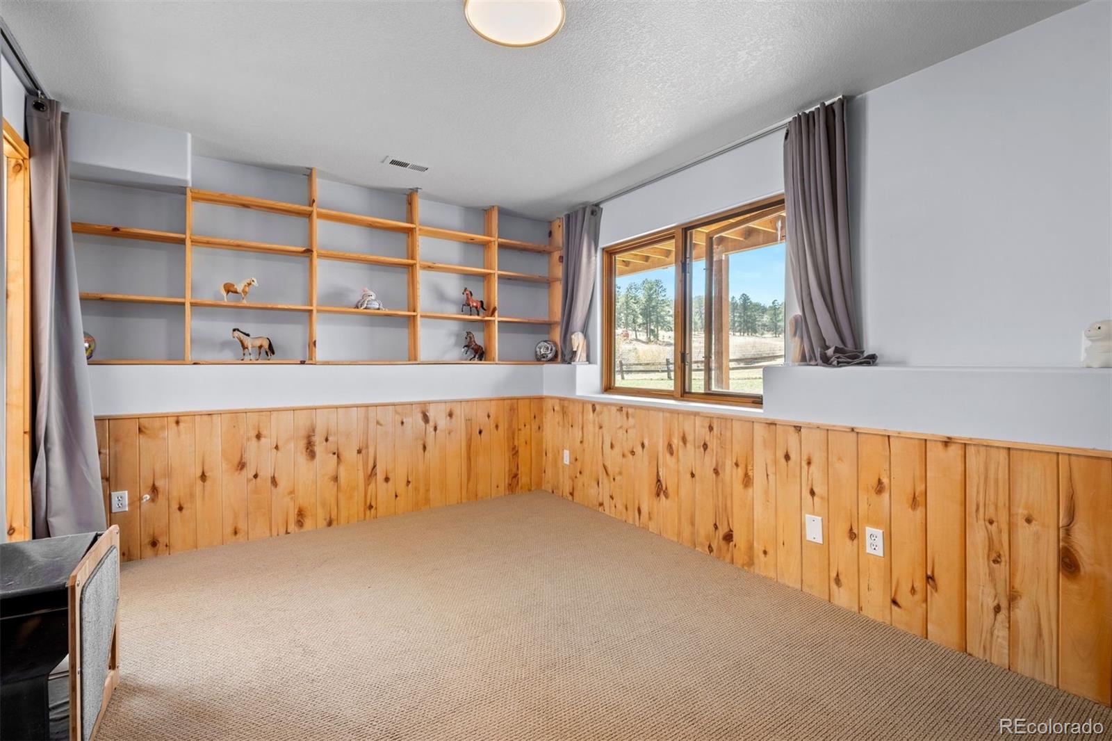 1740 County Road 72 Bailey, CO 80421 - Photo 24 of 40 a large white kitchen with a large window