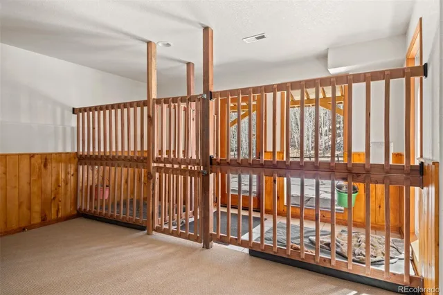 a view of staircase with rug