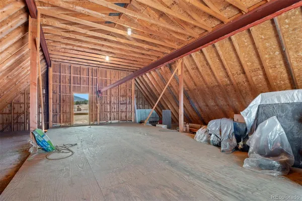 an aerial view of a house with lake view