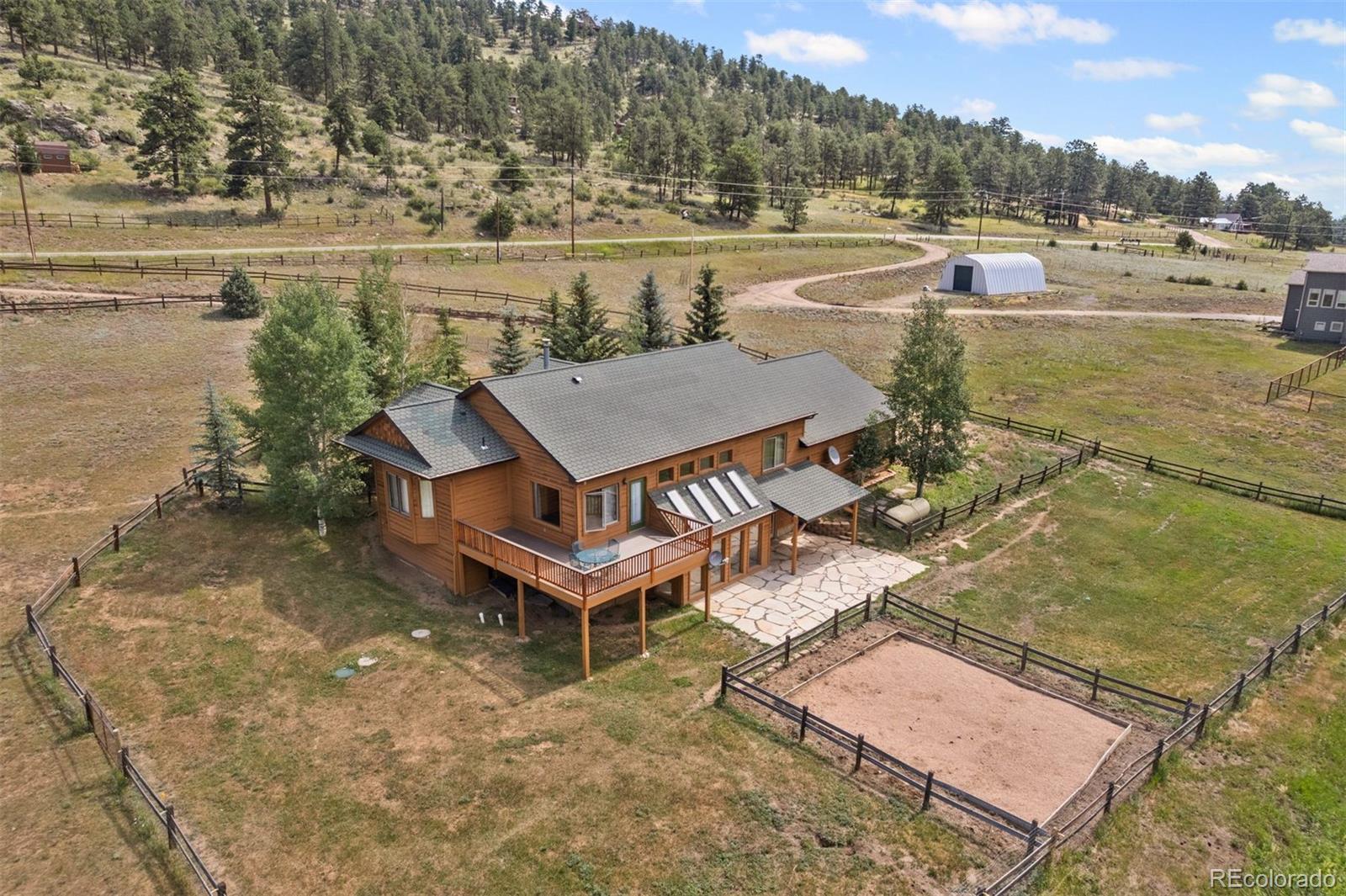 1740 County Road 72 Bailey, CO 80421 - Photo 34 of 40 an aerial view of a house with lake view