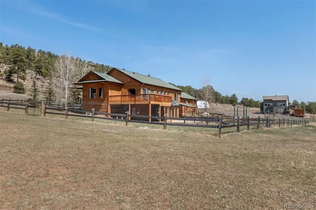 a view of a backyard of a house
