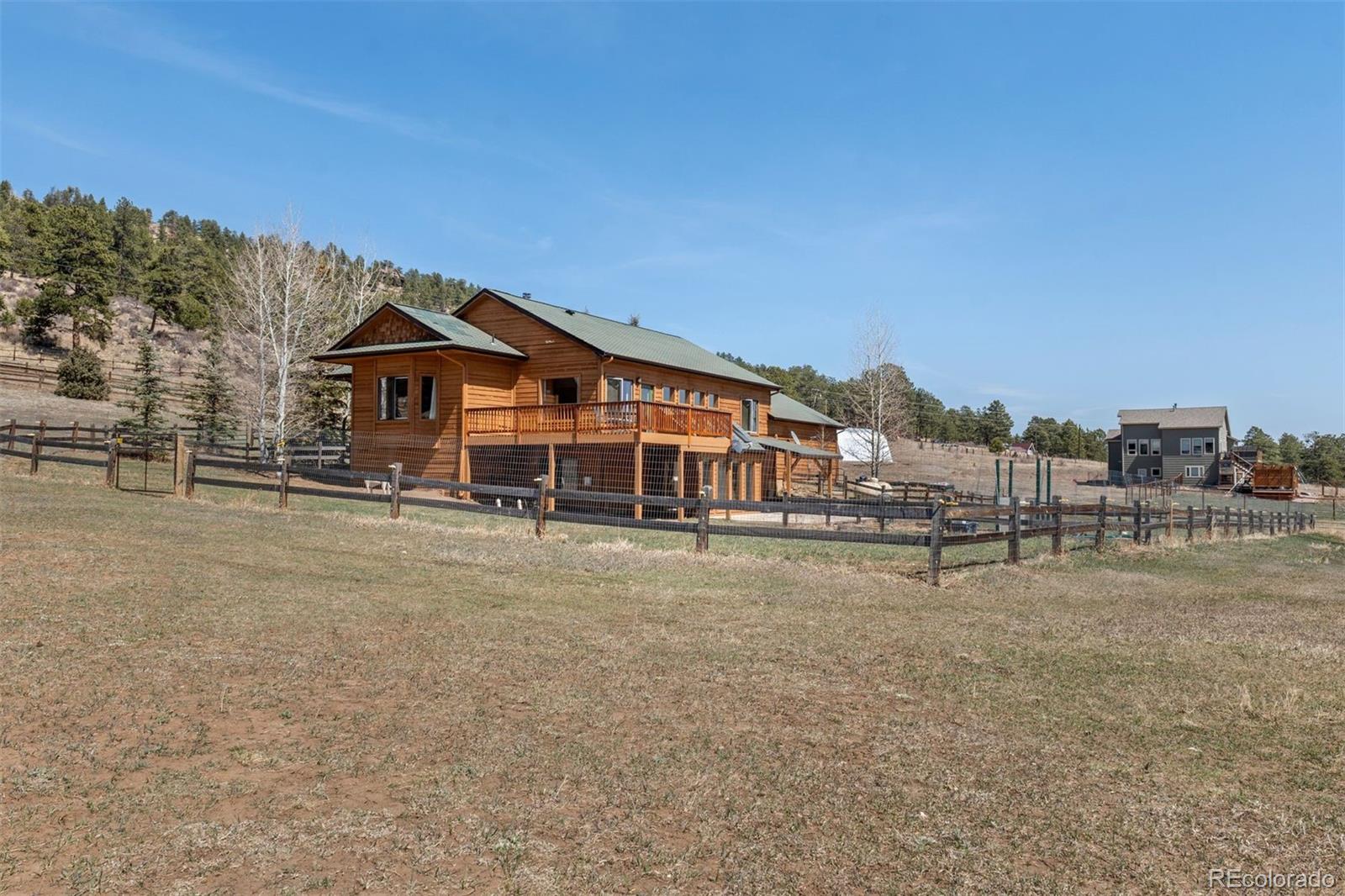 1740 County Road 72 Bailey, CO 80421 - Photo 35 of 40 a view of a house with a outdoor space