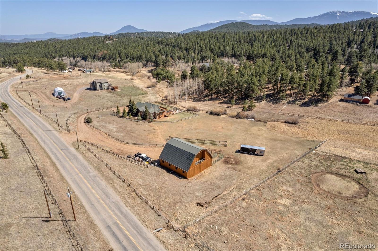 1740 County Road 72 Bailey, CO 80421 - Photo 38 of 40 a view of a terrace with mountain view