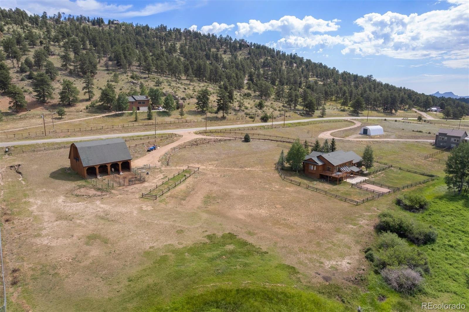 1740 County Road 72 Bailey, CO 80421 - Photo 39 of 40 a view of a town with big tree