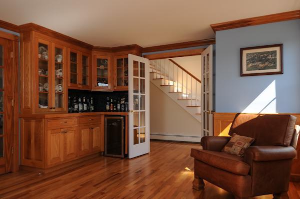141 Elliott Road Centerville, MA 02632 - Photo 11 of 17 a living room with furniture a fireplace and a wooden floor