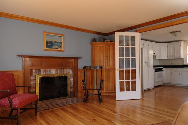 141 Elliott Road Centerville, MA 02632 - Photo 13 of 17 a view of a livingroom with furniture and a fireplace