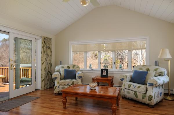 141 Elliott Road Centerville, MA 02632 - Photo 7 of 17 a living room with furniture and a large window