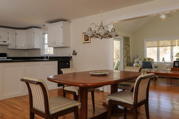 141 Elliott Road Centerville, MA 02632 - Photo 8 of 17 a view of a dining room with furniture window and wooden floor