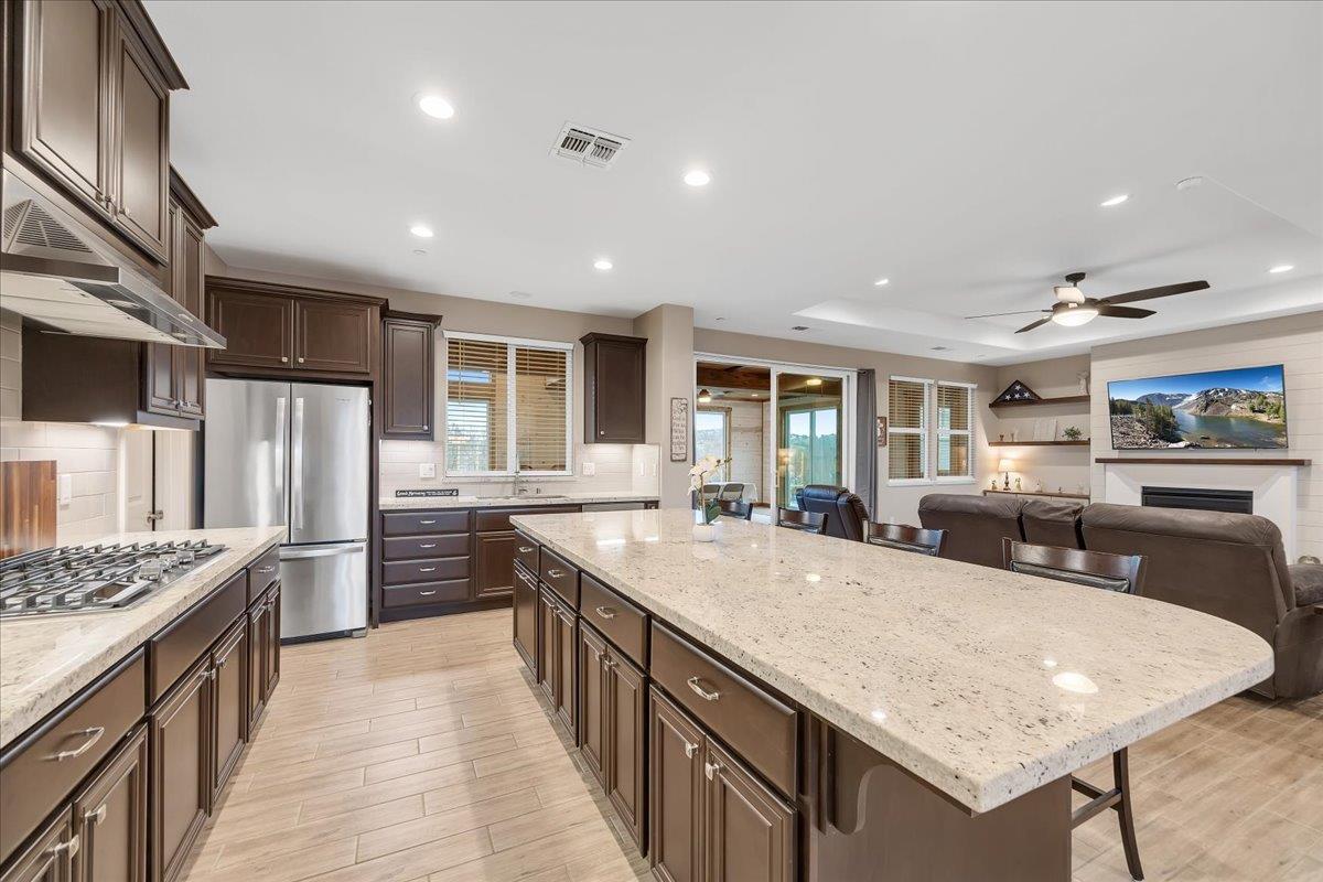 133 Palisades Place Copperopolis, CA 95228 - Photo 17 of 89 Beautiful granite-slab countertops for easy maintenance.