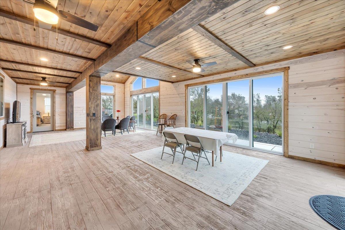 133 Palisades Place Copperopolis, CA 95228 - Photo 44 of 89 a dining room with furniture and wooden floor
