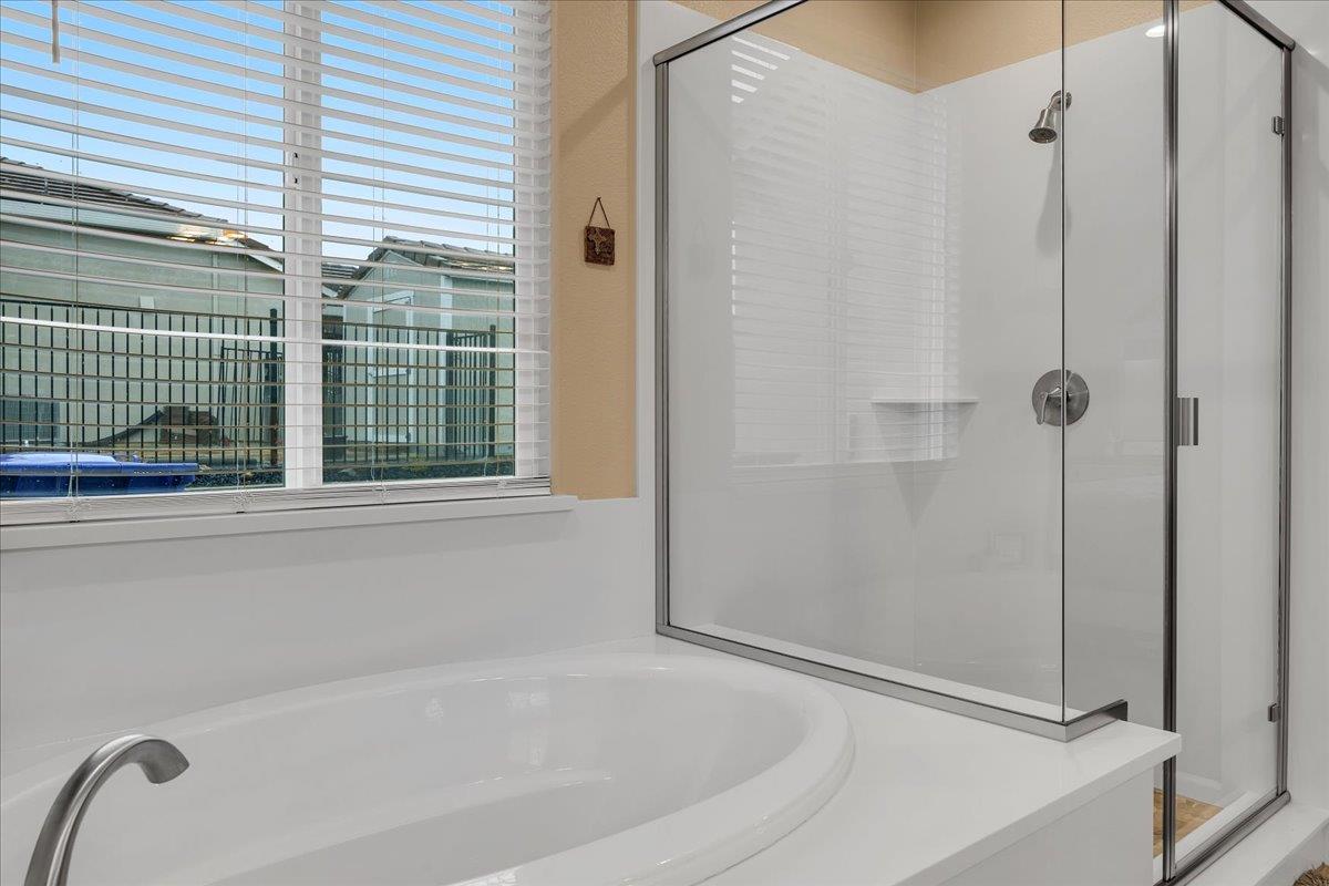 133 Palisades Place Copperopolis, CA 95228 - Photo 59 of 89 a bathroom with a bathtub and shower