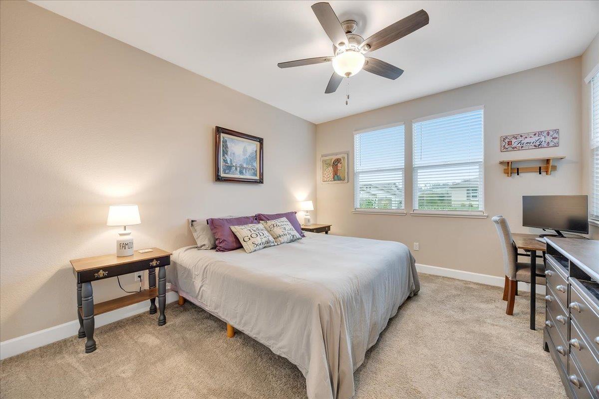 133 Palisades Place Copperopolis, CA 95228 - Photo 63 of 89 a bedroom with a bed desk and a window