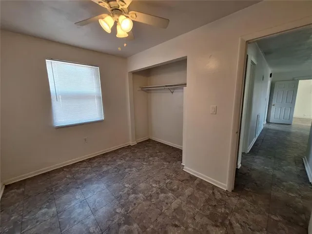 an empty room that has a window