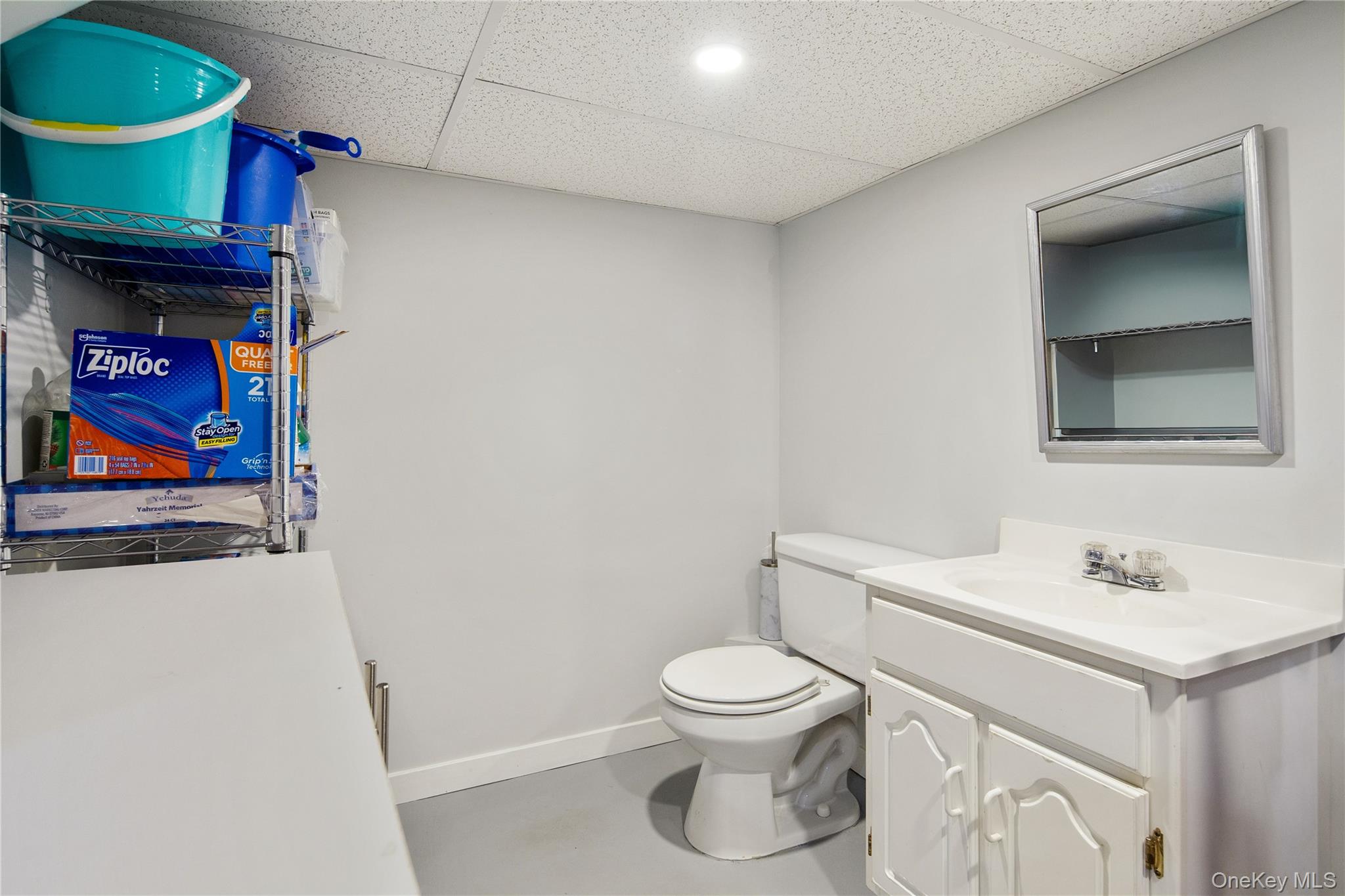 105 Cross Ridge Road Chappaqua, NY 10514 - Photo 41 of 43 Powder room tucked into mechanical/storage room