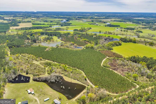 a view of a lake with a big yard