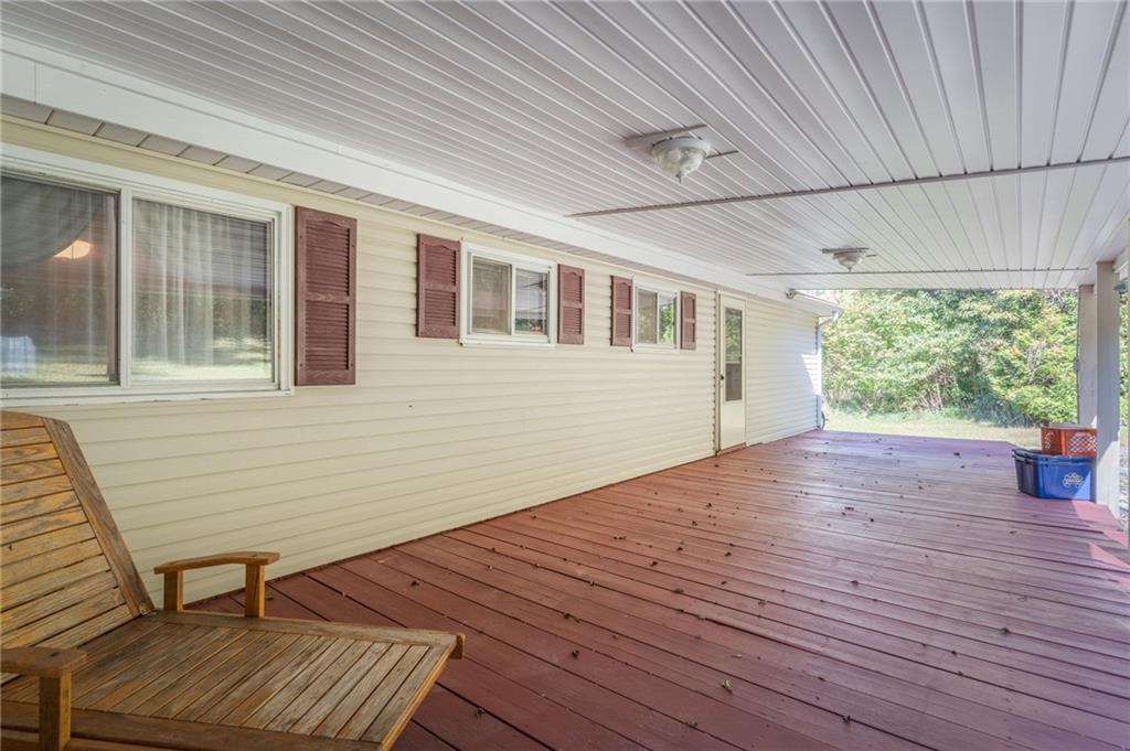 194 Conner School Road Wampum, PA 16157 - Photo 9 of 25 a view of a deck with wooden floor and outdoor space