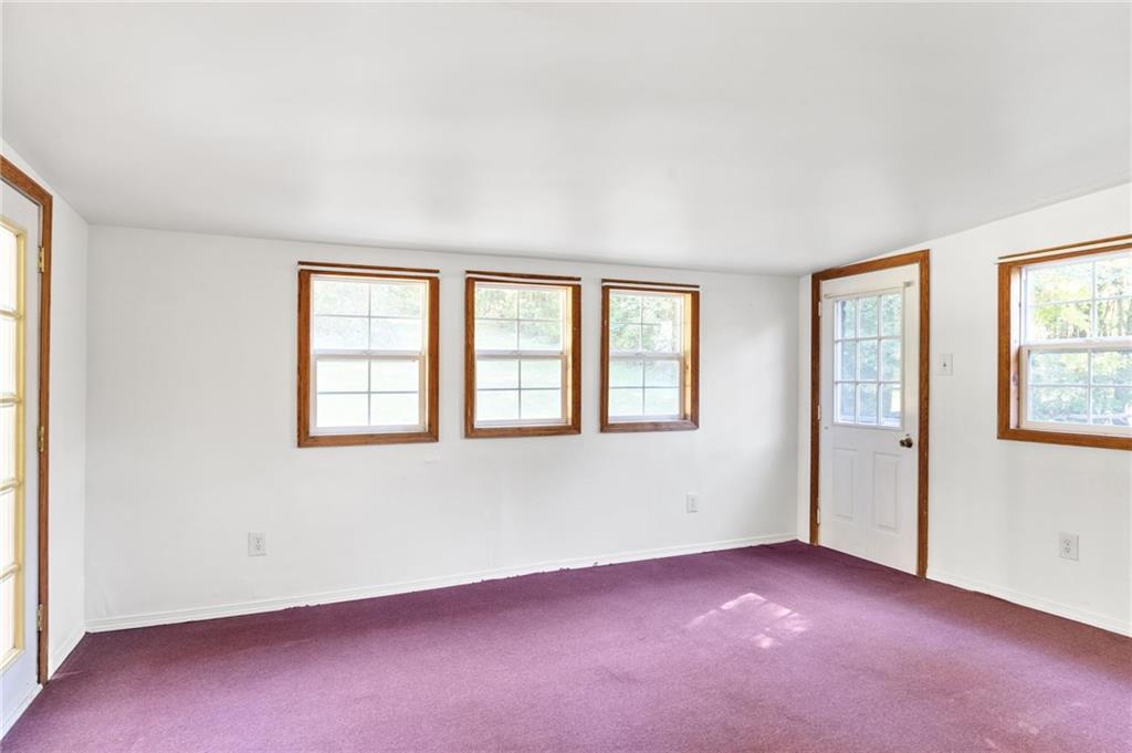 194 Conner School Road Wampum, PA 16157 - Photo 10 of 25 an empty room with windows