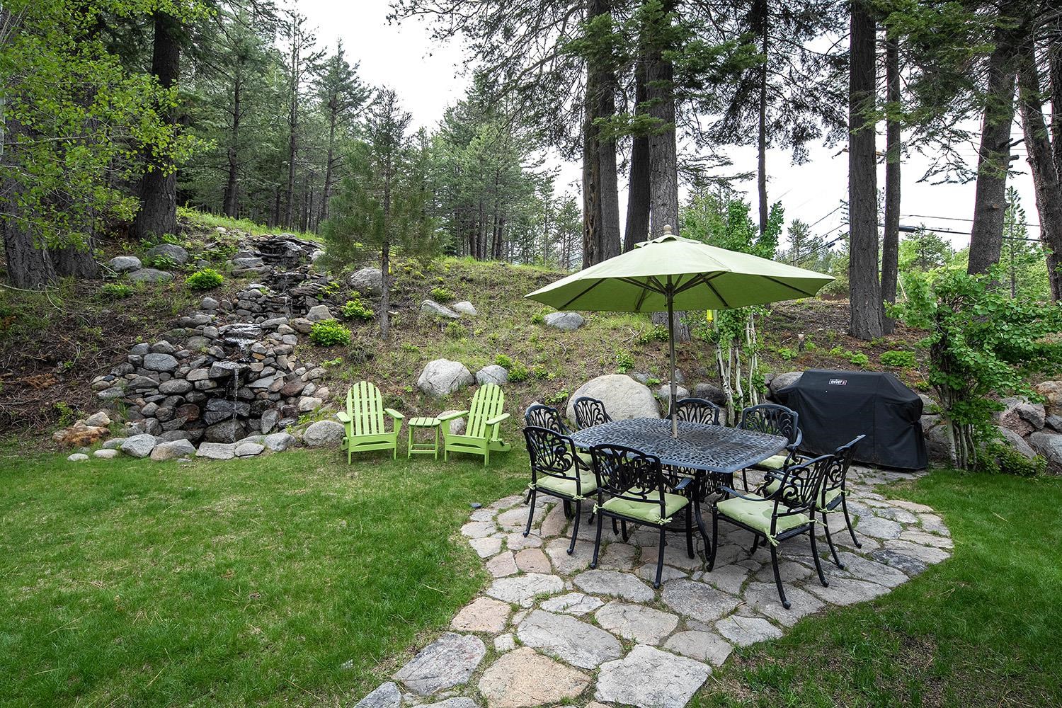 135 Alpine Meadows Road, Unit 33 Alpine Meadows, CA 96145 - Photo 18 of 21 a garden view with a seating space