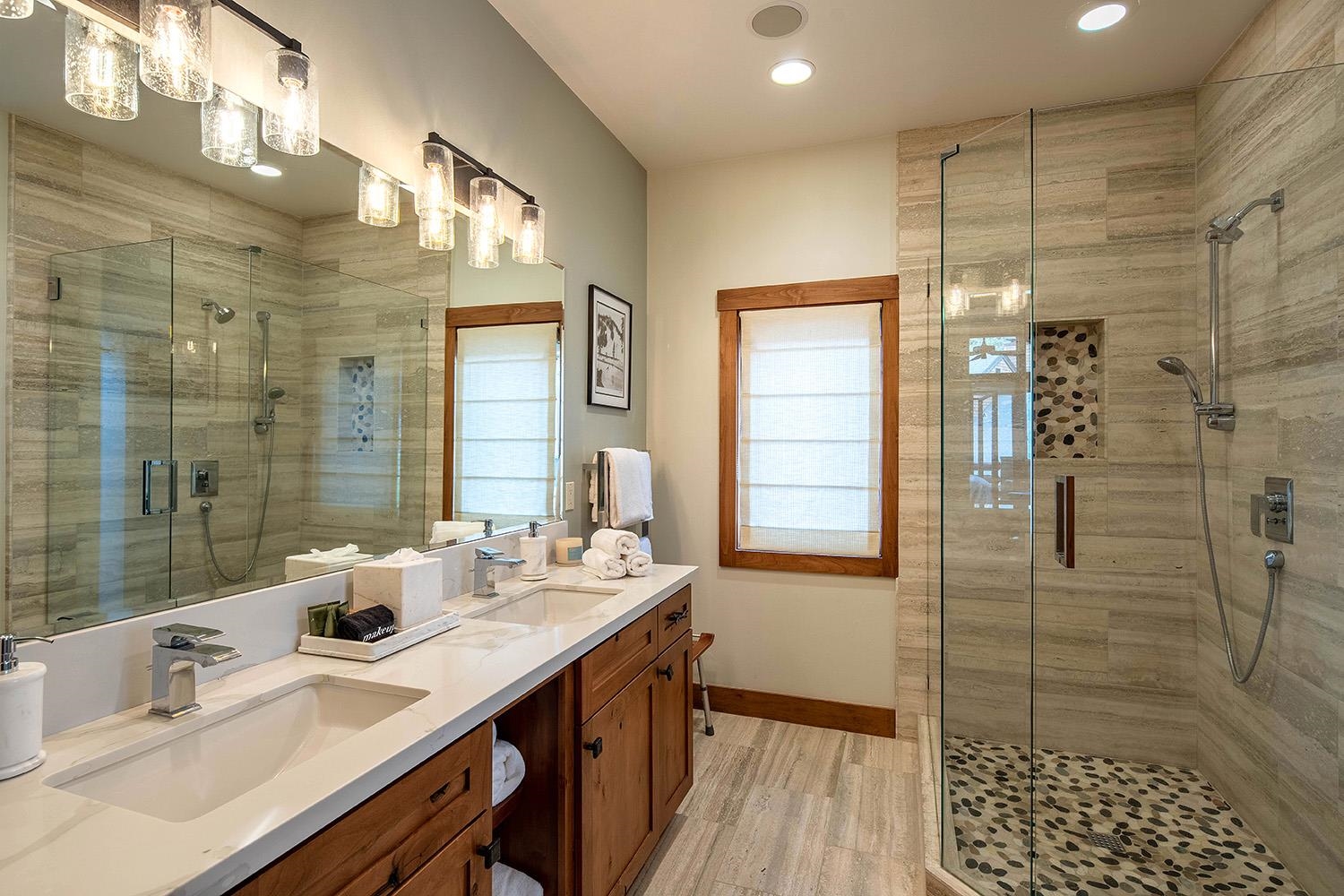 135 Alpine Meadows Road, Unit 33 Alpine Meadows, CA 96145 - Photo 9 of 21 a bathroom with double vanity and a shower