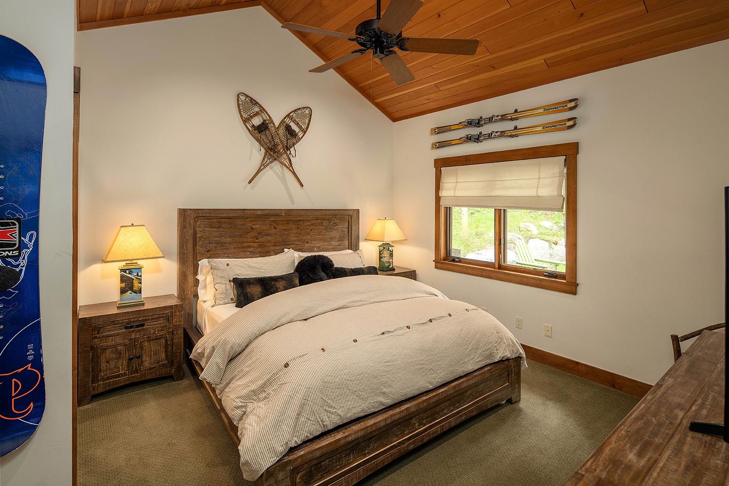 135 Alpine Meadows Road, Unit 33 Alpine Meadows, CA 96145 - Photo 10 of 21 a bed sitting in a bedroom next to a window