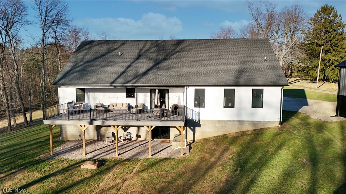 258 Friendly Acres Road Wellsburg, WV 26070 - Photo 28 of 47 Back of home featuring a yard, and a deck