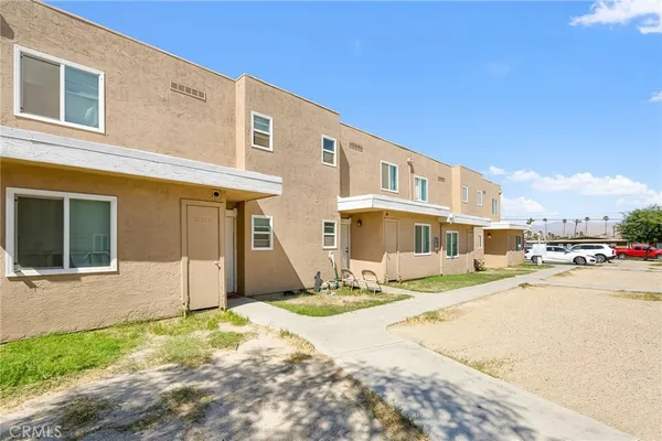 a view of a building with a street