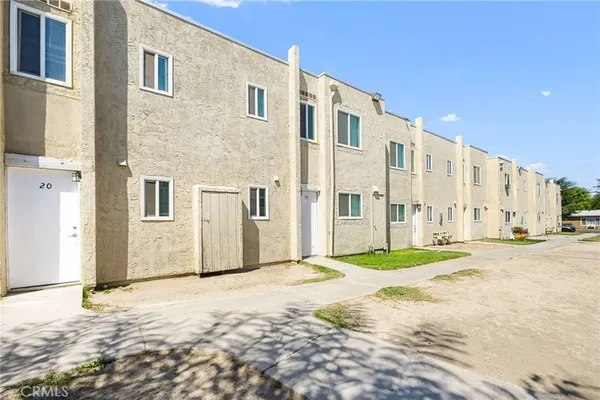 a view of street with parked cars
