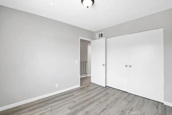 a bathroom with a toilet a sink and a mirror