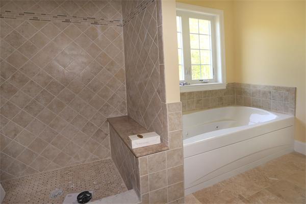 115 B Lakeshore Road Boxford, MA 01921 - Photo 15 of 21 a bathroom with a bathtub