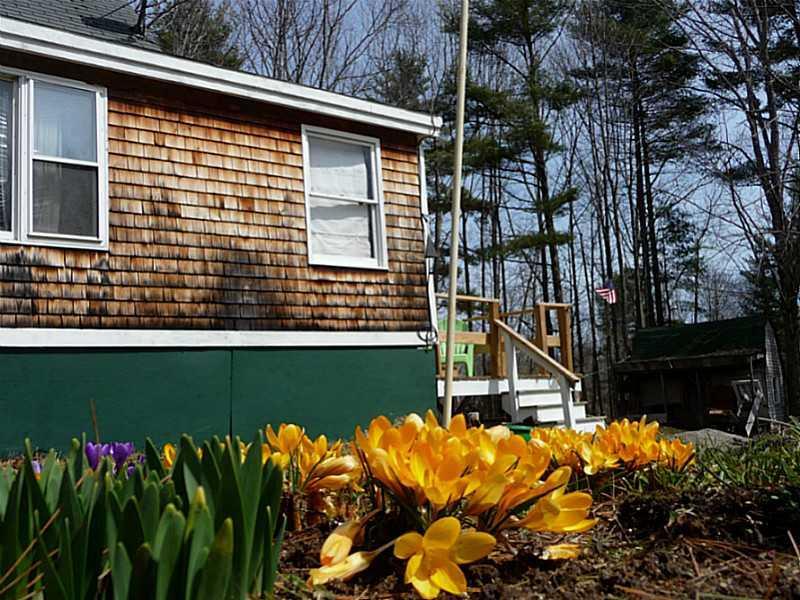 14 Gould Road Jefferson, ME 04348 - Photo 21 of 29 Exterior Front. Flower Garden...