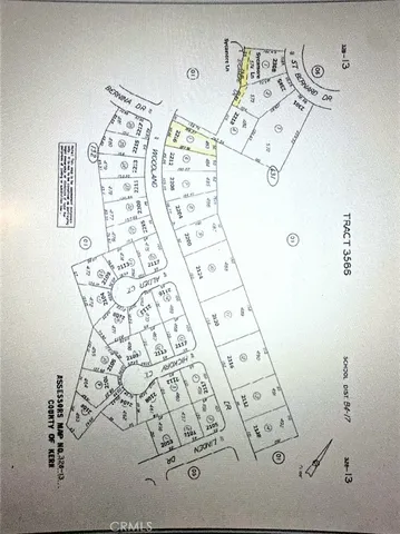 wooden floor with white walls