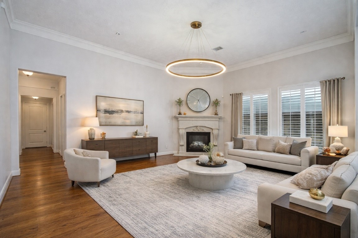 1463 Springrock Lane, Unit A Houston, TX 77055 - Photo 21 of 46 Virtually staged living area. Please note the chandelier shown has been digitally added.
