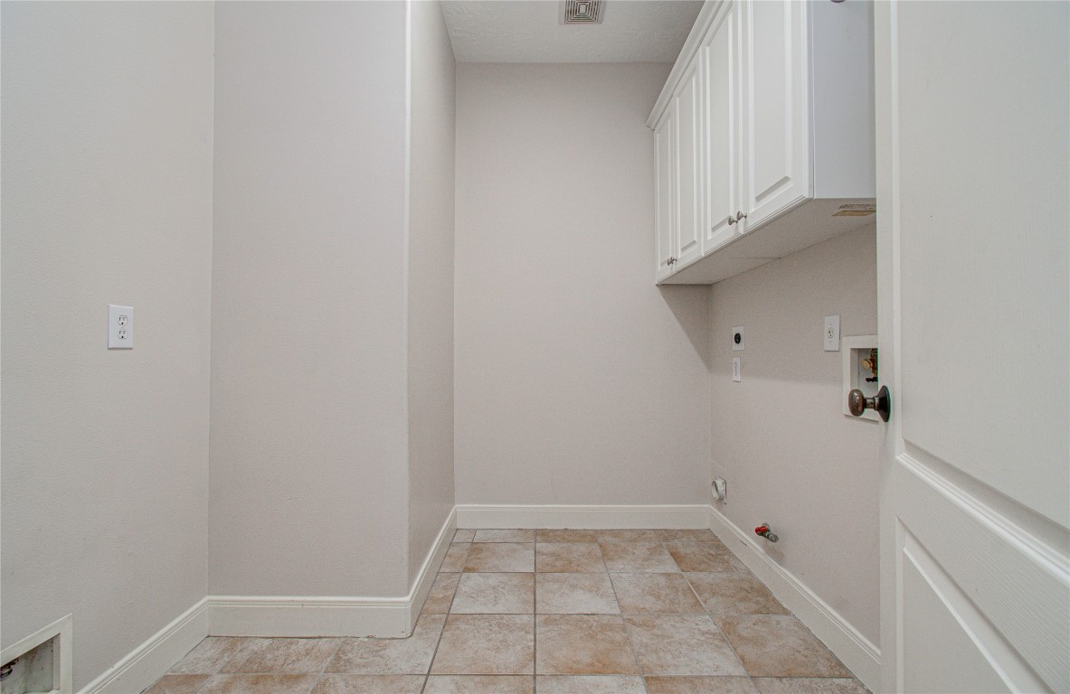 1463 Springrock Lane, Unit A Houston, TX 77055 - Photo 24 of 46 Laundry room conveniently located on the first floor.