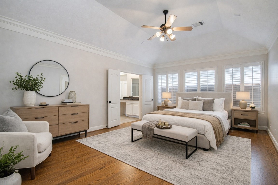 1463 Springrock Lane, Unit A Houston, TX 77055 - Photo 25 of 46 Primary bedroom located on the first floor with an en-suite bath. Virtually staged for illustration purposes.