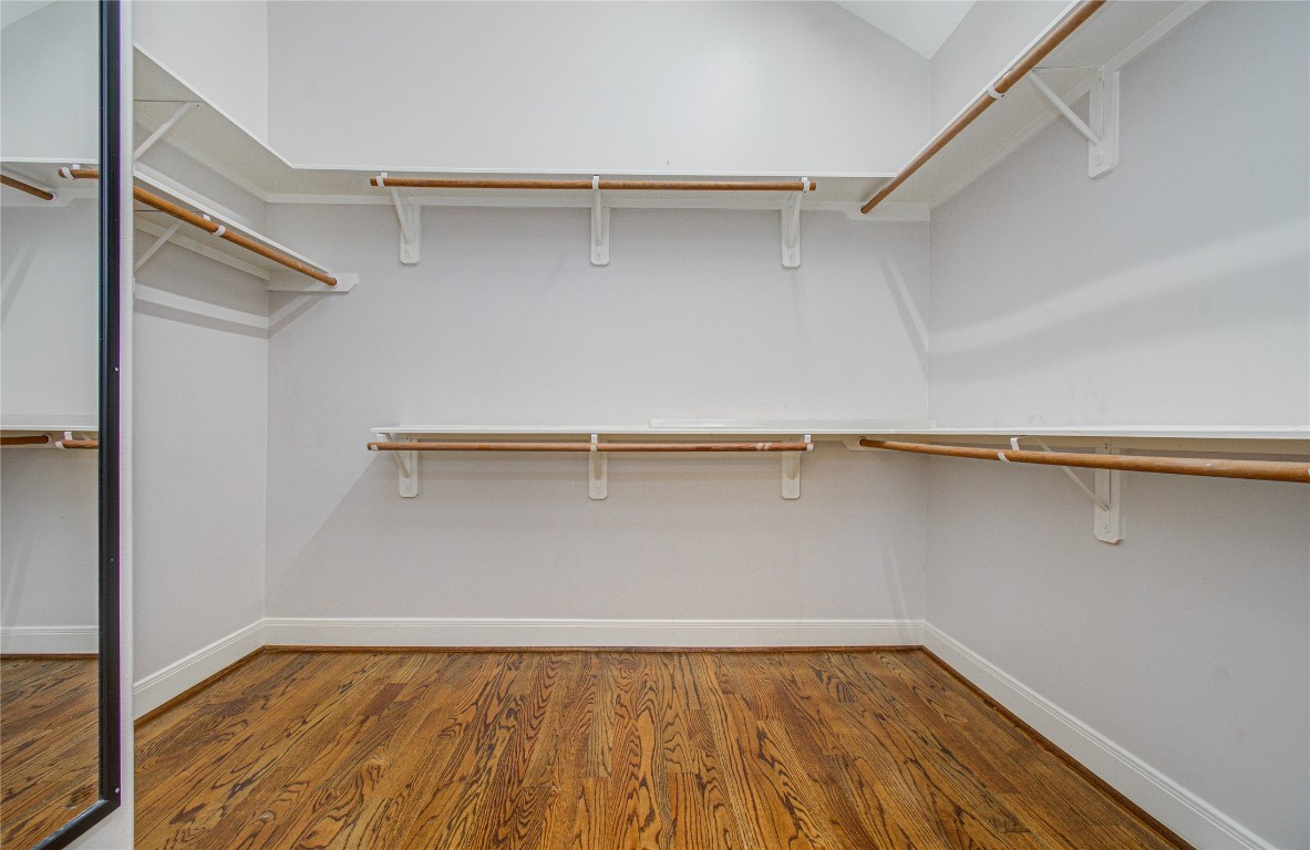 1463 Springrock Lane, Unit A Houston, TX 77055 - Photo 32 of 46 a view of a room with wooden floor