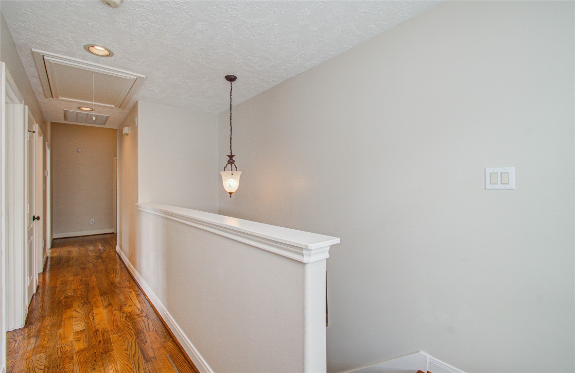 1463 Springrock Lane, Unit A Houston, TX 77055 - Photo 33 of 46 Second floor features two bedrooms and a spacious game room, offering great flexibility for additional living, work, or play space.